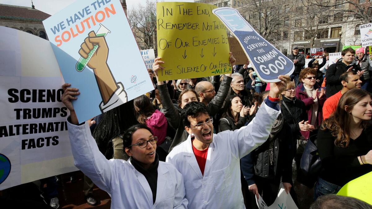Scientists rally in Boston in February. Tens of thousands of scientists and science enthusiasts are expected in downtown Los Angeles on Saturday for the March for Science, one of more than 500 such events around the world.