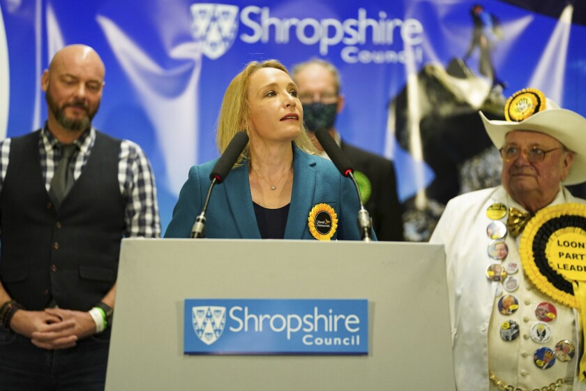 Helen Morgan of the Liberal Democrats makes a speech after being declared the winner in the North Shropshire by-election in Shrewsbury, England early Friday Dec. 17, 2021. The Liberal Democrats overturned an almost 23,000 Conservative majority to win the special election that was sparked by the resignation of Owen Paterson, a result that heaps further pressure on British Prime Minister Boris Johnson. (Jacob King/PA via AP)