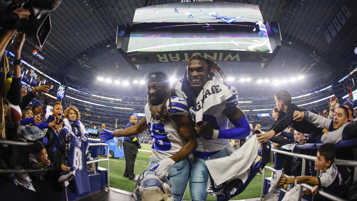 Cowboys face Titans, still in chase for NFC East title - The San Diego  Union-Tribune