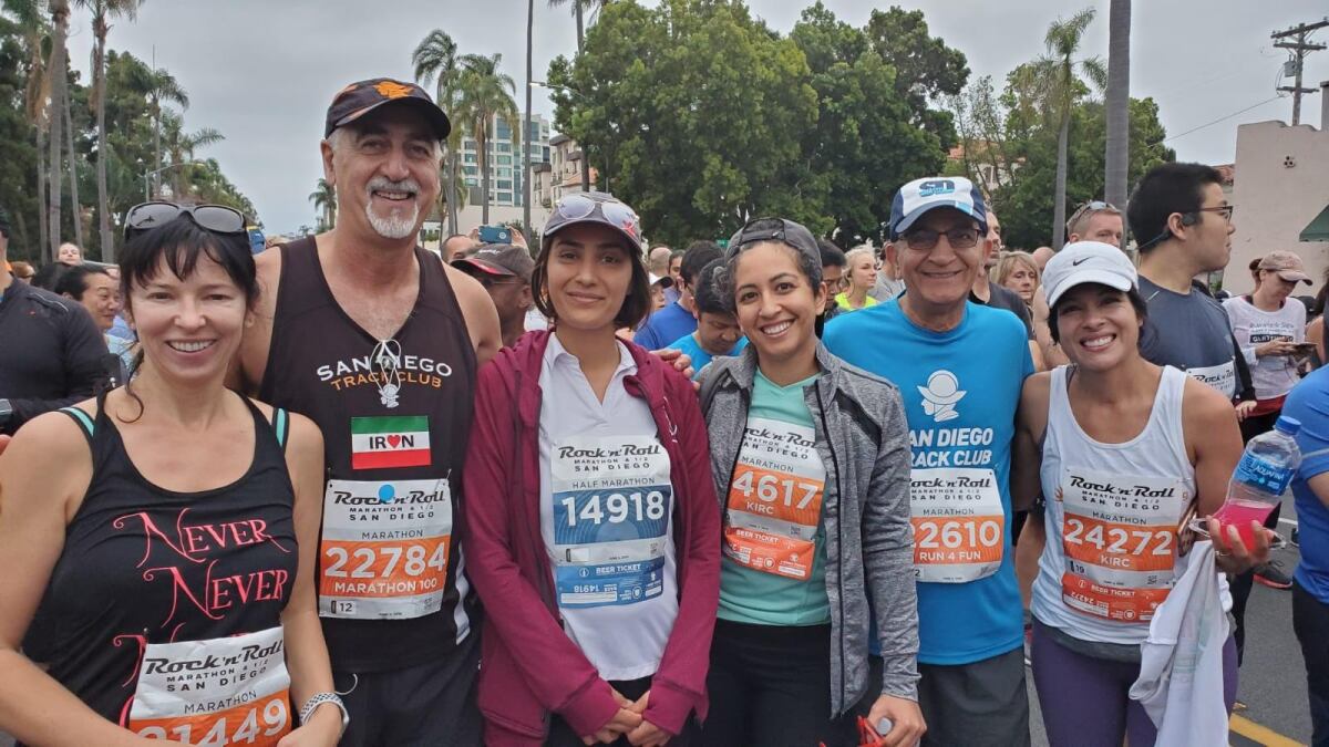 Ghazinouri with members of the San Diego Track Club prior to the start of the 2019 San Diego Rock 'n' Roll Marathon.<br>
