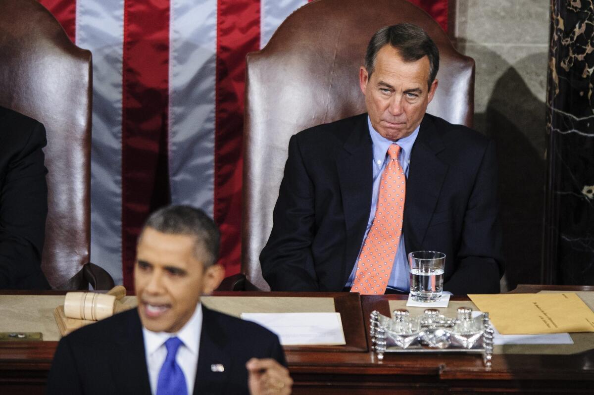 House Speaker John A. Boehner (R-Ohio) looks on Tuesday as President Obama delivers his first State of the Union address since winning reelection.