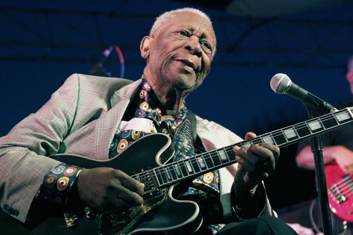 In this photo taken Aug. 22, 2012, B.B. King performs at the 32nd annual B.B. King Homecoming. The blues legend's website says he is in hospice care at his home in Las Vegas.