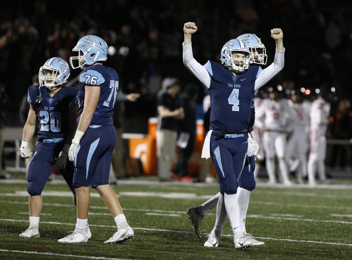 Corona del Mar's Ethan Garbers (4) celebrates in the CIF Southern Section Division 3 title game against Grace Brethren on Nov. 29 at Newport Harbor High.