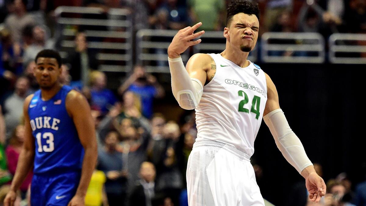 Oregon guard Dillon Brooks reacts after making a three-point shot against Duke on Thursday night.