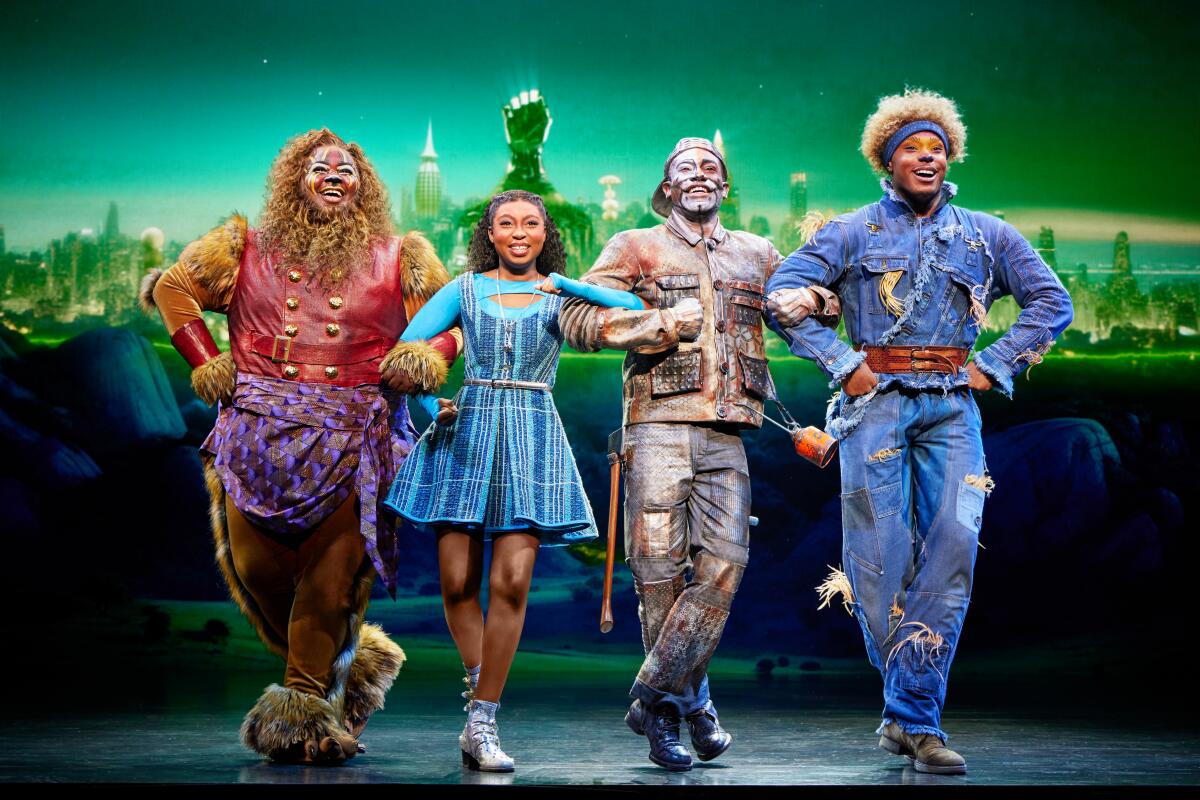 The Cowardly Lion, Dorothy, Tin Man and Scarecrow in "The Wiz."