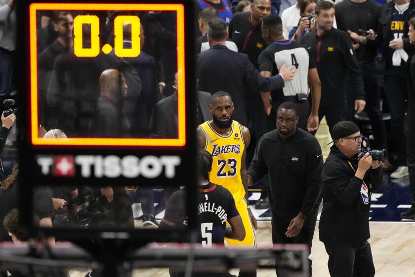 Los Angeles Lakers forward LeBron James (23) walks off the court after a loss to the Denver Nuggets in Game 2 of an NBA basketball first-round playoff series Monday, April 22, 2024, in Denver. (AP Photo/Jack Dempsey)