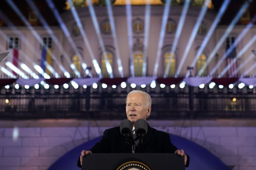 President Joe Biden delivers a speech marking the one-year anniversary of the Russian invasion of Ukraine, Tuesday, Feb. 21, 2023, at the Royal Castle Gardens in Warsaw. (AP Photo/ Evan Vucci)