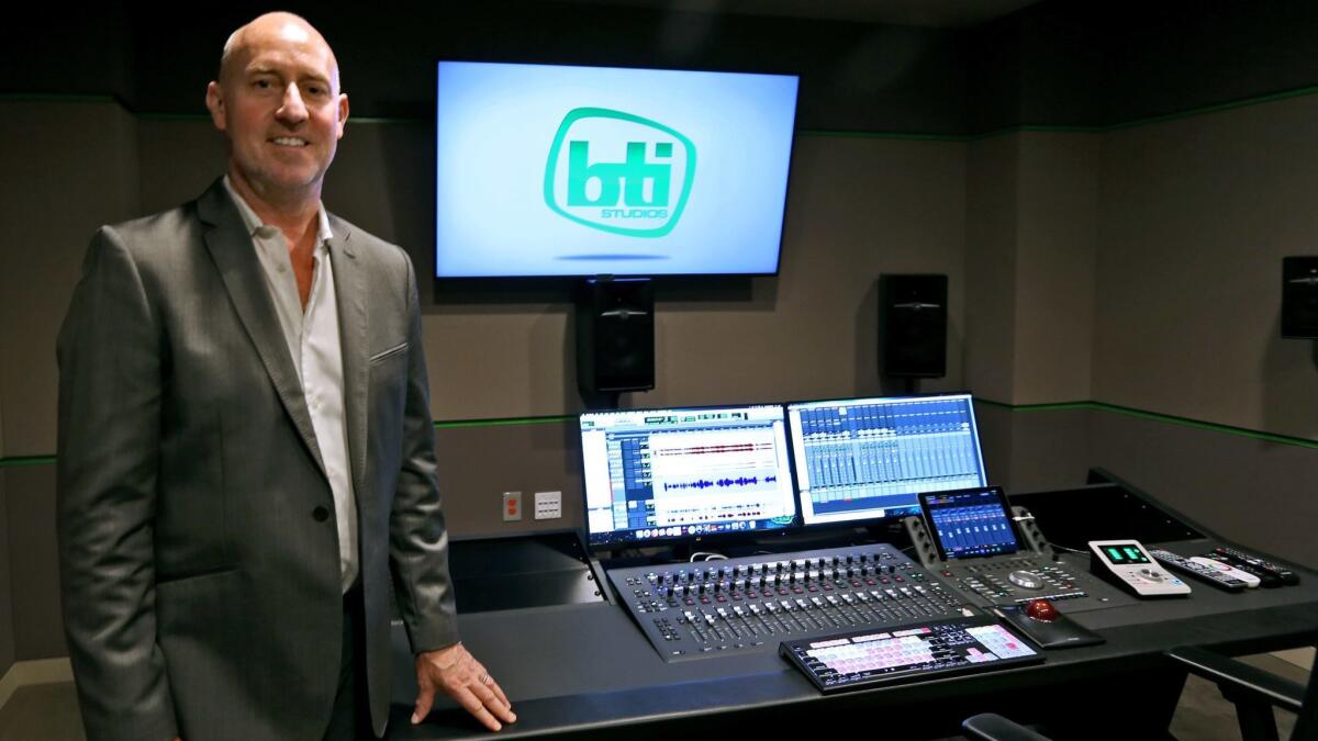 BTI Studios has opened its first audio dubbing and subtitling facility in the United States, on the 3600 block of West Olive Avenue in Burbank on Thursday, June 20, 2019. Above, Chris Carey, the company's chief revenue officer, stand by one of the mixing studios.