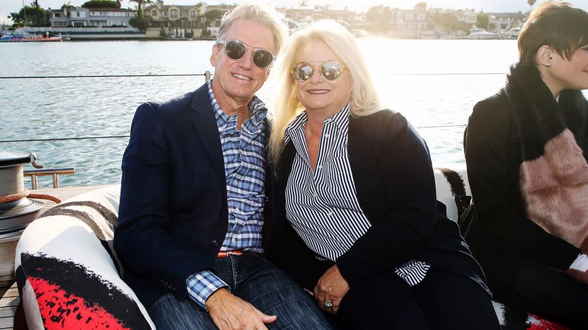 Marshall Watson and Wendy Lyon enjoy a sail on Newport Bay aboard the yacht "Foggy."