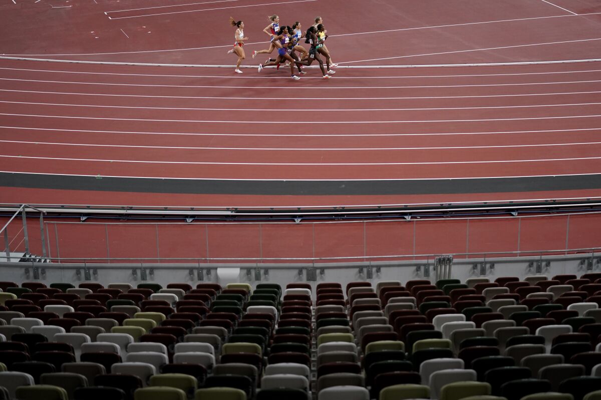 Competitors run in the semifinal of the women's 800-meters at the 2020 Summer Olympics, Saturday, July 31, 2021, in Tokyo. (AP Photo/Jae C. Hong)