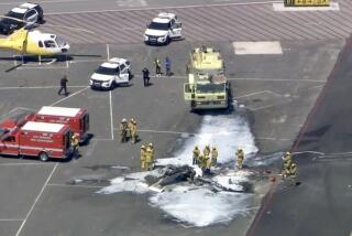 A small plane has crashed and caught fire at Van Nuys Airport, but there's no immediate word on injuries. Los Angeles Fire Department crews have doused the fire.