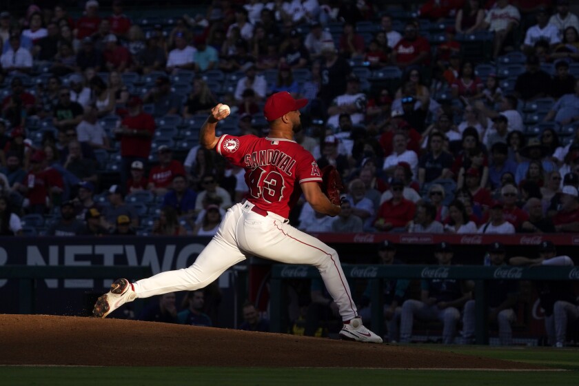 Angels starting pitcher Patrick Sandoval pitches during the first half against the Mariners.