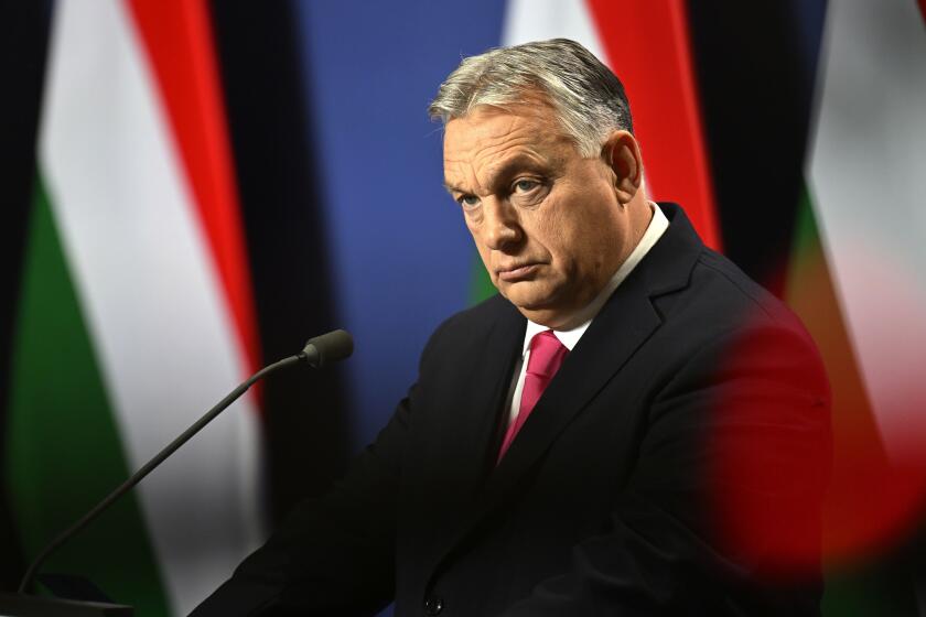 FILE - Hungarian Prime Minister Viktor Orban arrives for an annual international press conference in Budapest, Hungary, Thursday, Dec. 21, 2023. Nearly two years after Sweden formally applied to join NATO, its membership now hinges on convincing one country, Viktor Orbán's Hungary to formally ratify its bid to join the military alliance. (AP Photo/Denes Erdos, File)