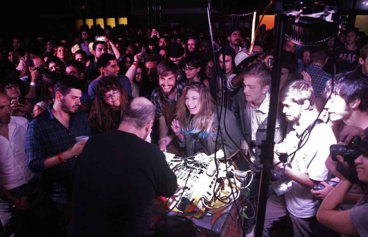 DJ Dan Deacon surrounded by guests at the Station to Station event on Sep. 26, 2013. Doug Aitken's art train arrival at Union Station in Los Angeles. Train has travelled from NY to LA on a three week musical/art festival.