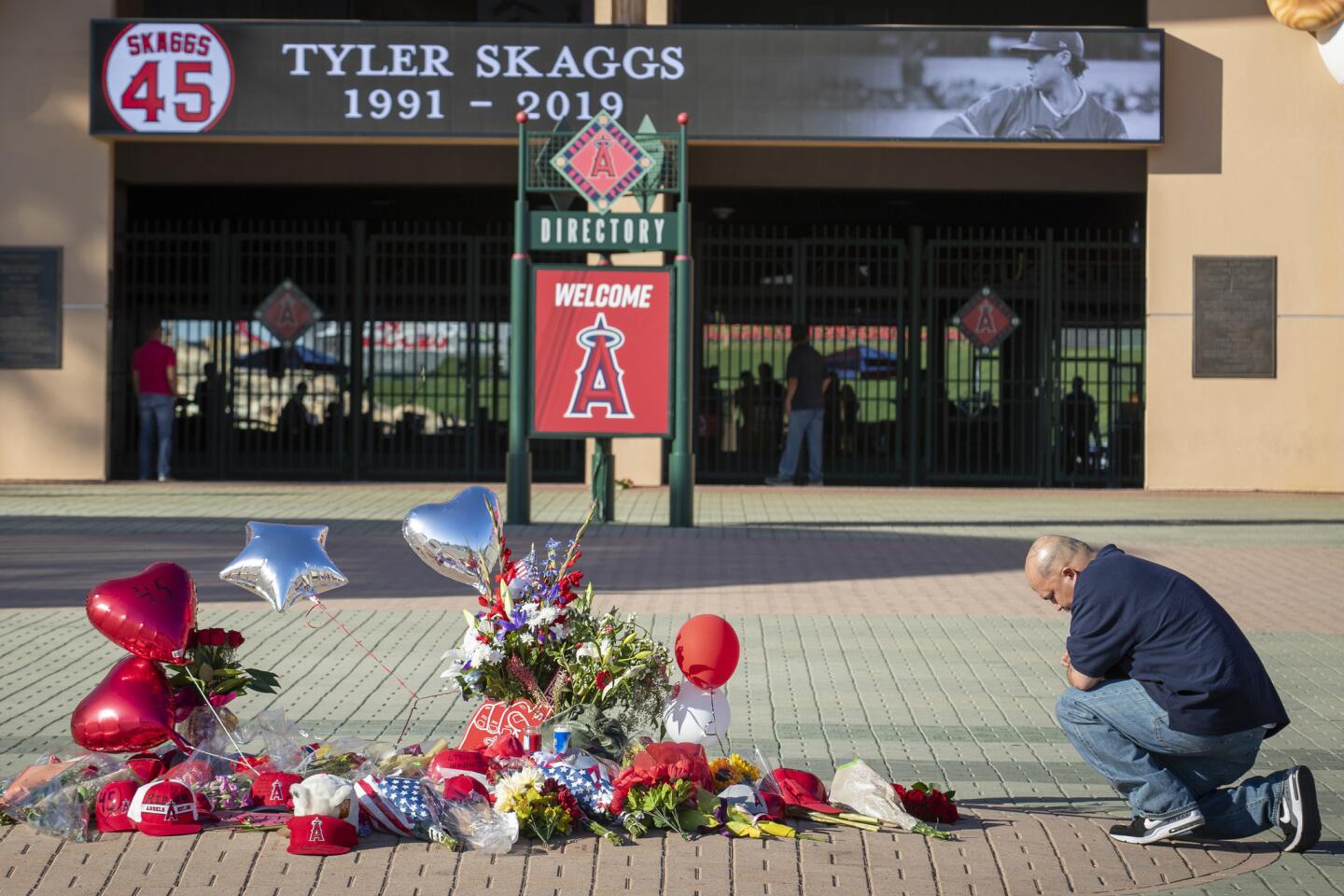 Fans gather outside Angel Stadium to mourn death of Tyler Skaggs