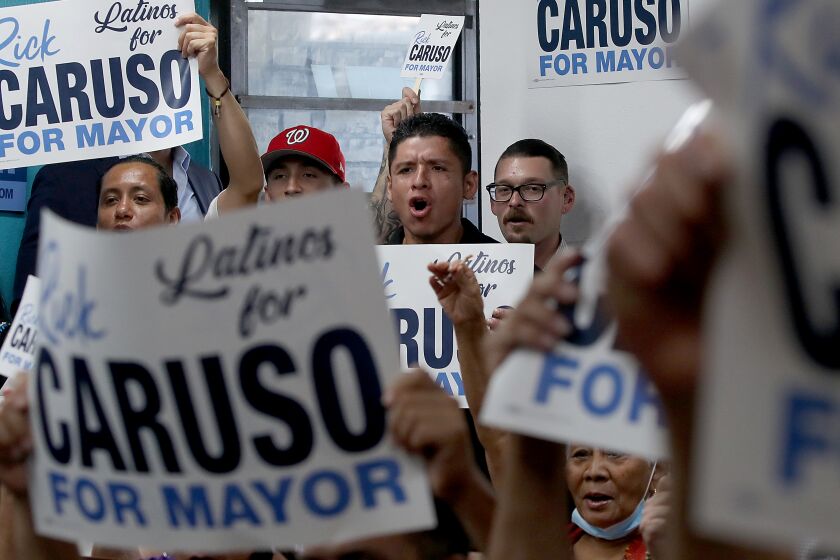 LOS ANGELES, CALIF. - AUG. 11, 2022.. Latino supporters of Los Angeles mayoral candidate Rick Caruso gather at a Nicaraguan restaurant in Los Angeles on Thursday, Aug. 11, 2022. L.A. City Councilman Gil Cedillo has endorsed Caruso's campaign. (Luis Sinco / Los Angeles Timesd)