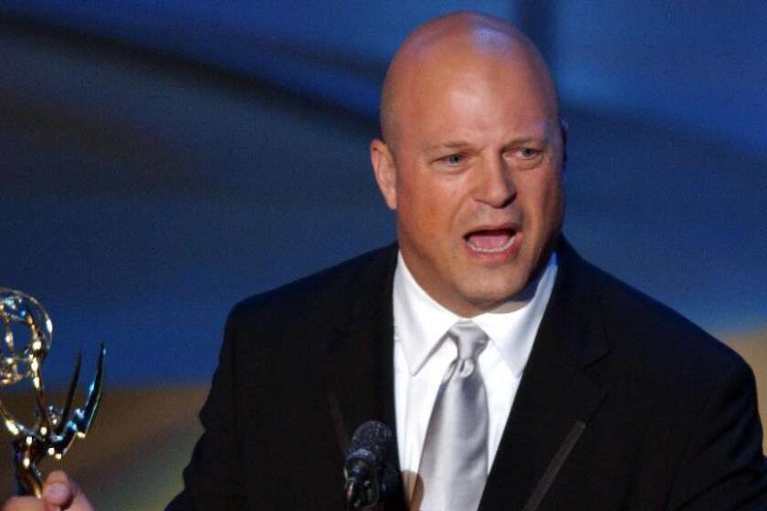 Story Slug: emmypromo23.ART|emmypromo23.ART US actor Michael Chiklis accepts the award for Outstanding Lead Actor in a Drama Series for "The Shield," at the 54th Annual Primetime Emmy Awards, at the Shrine Auditorium in Los Angeles, CA, 22 September 2002. AFP PHOTO/Lucy NICHOLSON ORG XMIT: LUC19