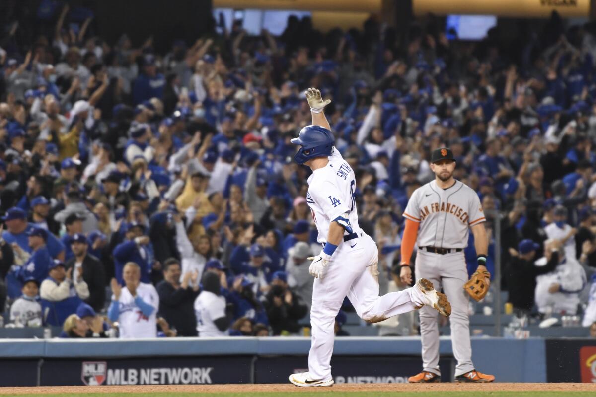 Will Smith circles the bases after his Game 4 home run.