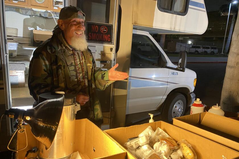 Vaskin Koshkerian of Micah's Way stands outside his RV near the Central Jail Complex in Santa Ana.