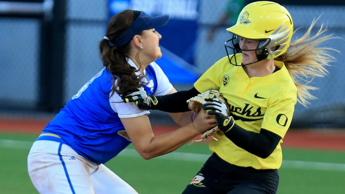 Kylee Perez, tagging out Oregon's Jenna Lilley during a Super Regional game, and UCLA will try to advance in the NCAA tournament on Saturday.