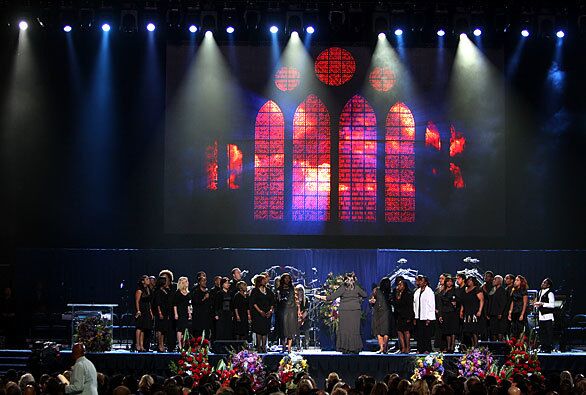 Michael Jackson's memorial begins with an Andrae Crouch Choir performance at Staples Center.