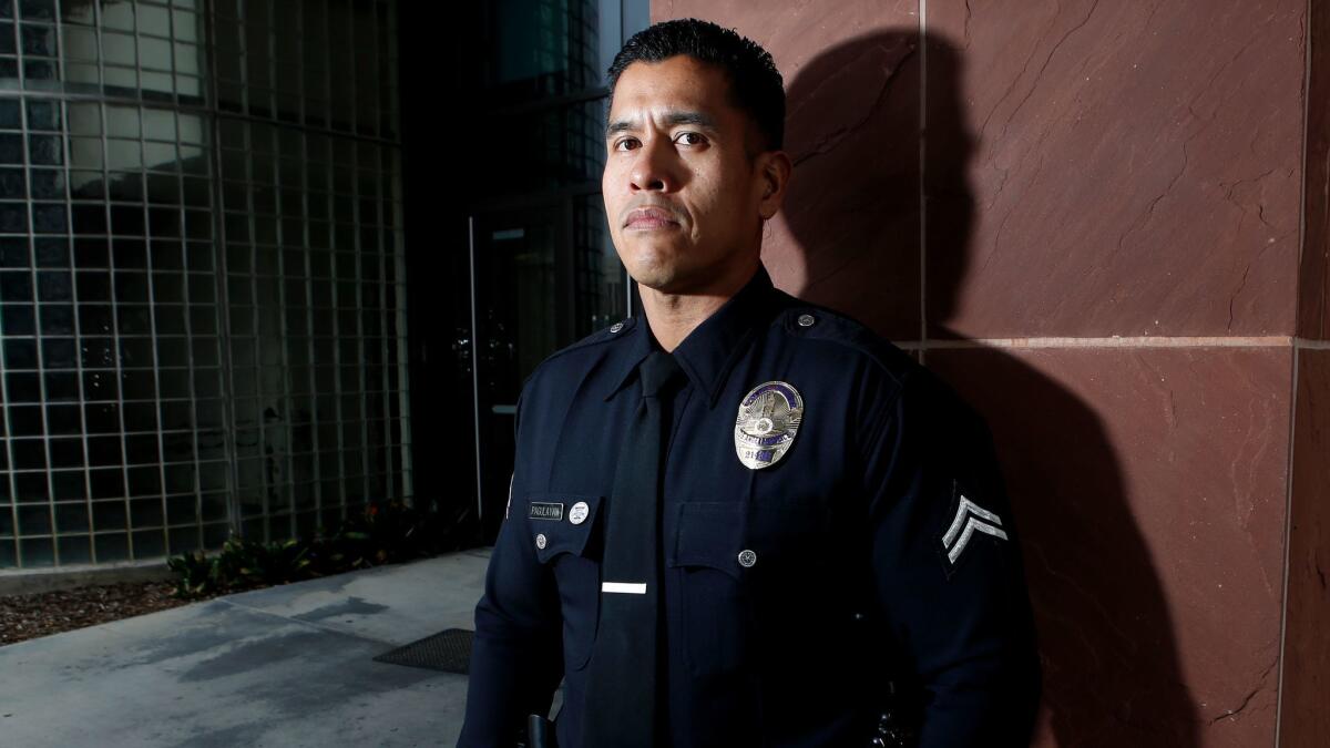 Officer Dante Pagulayan, who went to high school and college with Matthew Medina, is Medina's partner in the LAPD's Harbor Division. "He is a loving father and friend," Pagulayan said. (Christian K. Lee / Los Angeles Times)