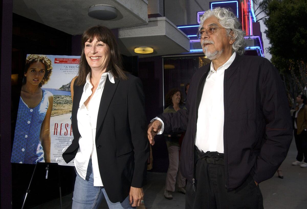 Actress Anjelica Huston and husband Robert Graham attend the L.A. premiere of "Respiro" at Laemmle's Monica 4 Plex in 2005 in Santa Monica. The theater is closed for renovations that include two new restaurants.