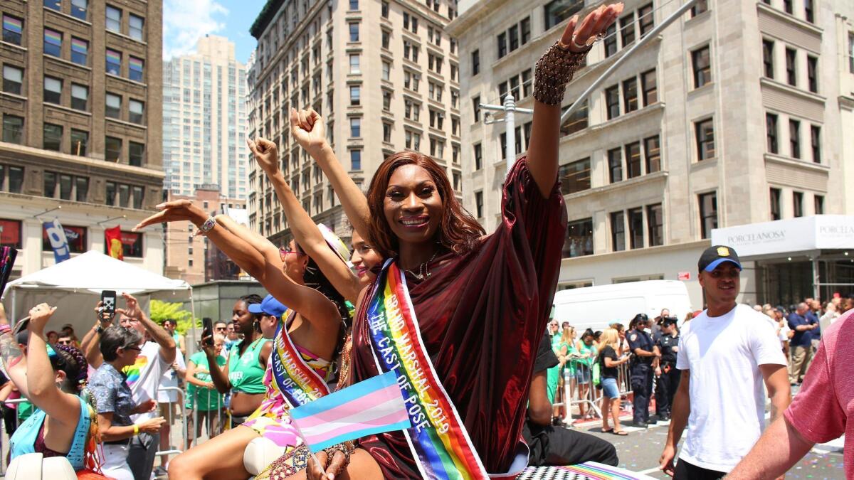 People participate in the New York Pride March on Sunday in New York City. The march marks the 50th anniversary of the Stonewall riots in the Greenwich Village neighborhood of Manhattan on June 28, 1969.