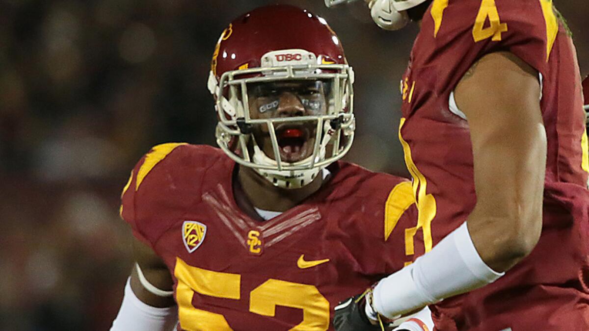USC's Quinton Powell celebrates during a game against Stanford in 2013.