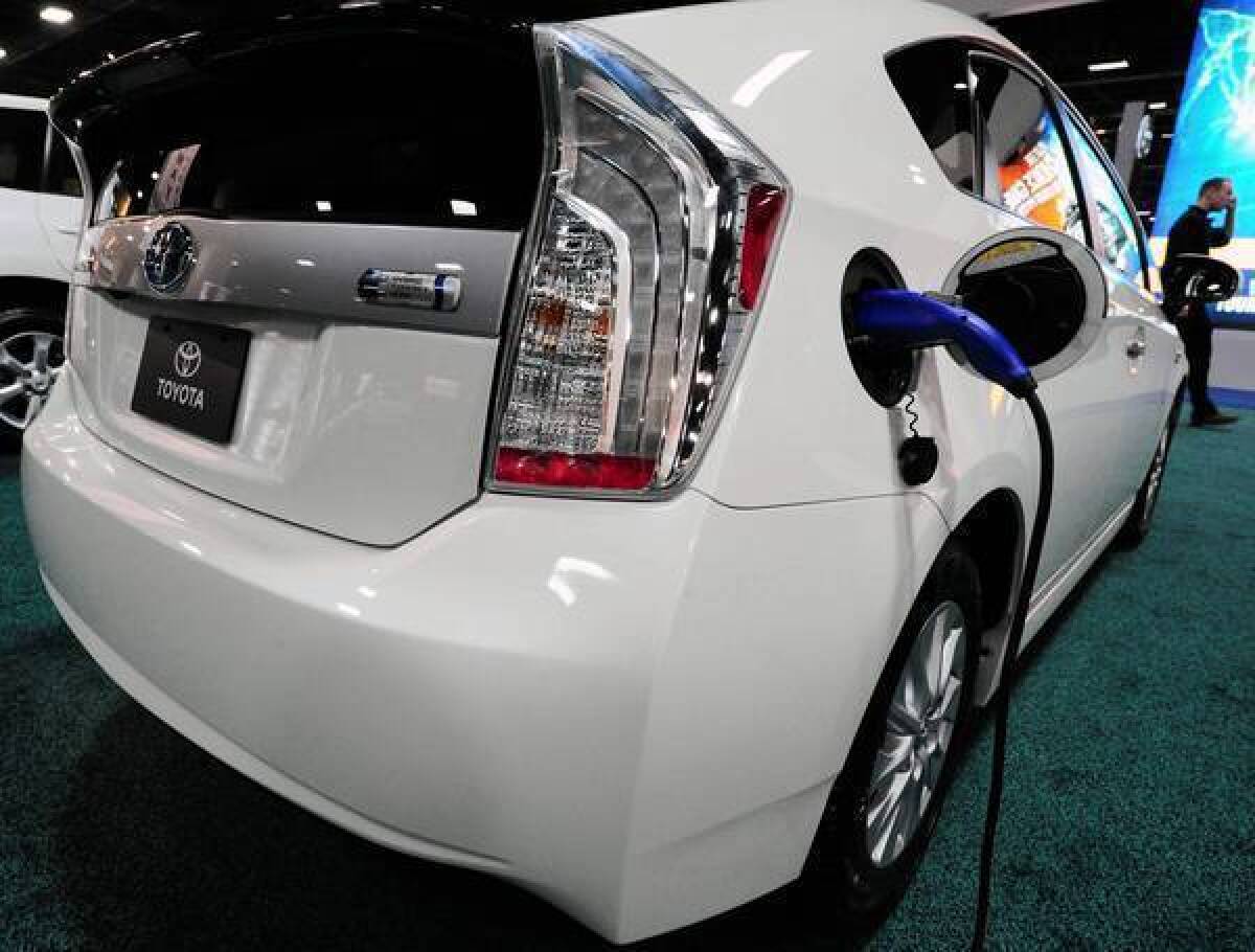 Toyota sold 4,374 of its Prius plug-ins in the first half of this year, about 60% of them in California.