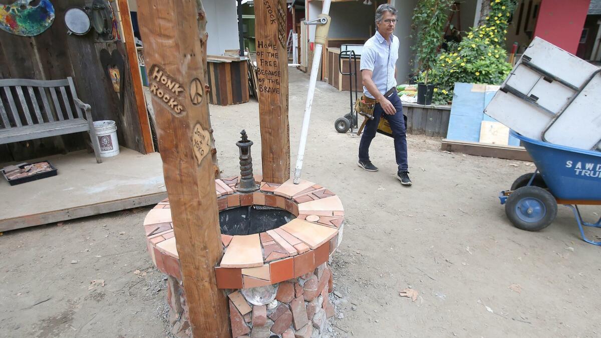 During a recent look at the Sawdust Festival grounds, the “well of creativity” at the entrance is almost ready for the summer show, which opens to the public Friday.