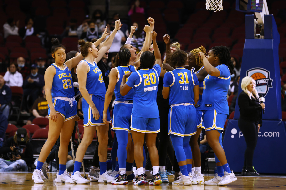 UCLA players huddle before a game against Connecticut in New Jersey on Dec. 11.
