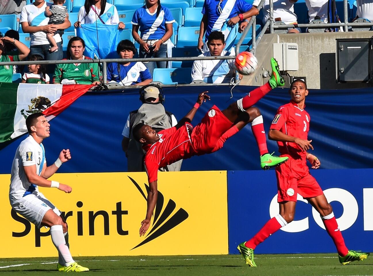 Cuba's Maikel Reyes does a bicycle kick during a CONCACAF Gold Cup Group C match against Guatemala in Charlotte, North Carolina, on July 15, 2015. AFP PHOTO/NICHOLAS KAMMNICHOLAS KAMM/AFP/Getty Images ** OUTS - ELSENT, FPG - OUTS * NM, PH, VA if sourced by CT, LA or MoD **
