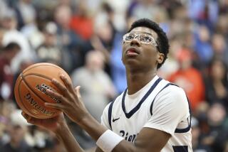 Sierra Canyon's Bryce James #5 warms up against Christopher Columbus at halftime during a high school basketball game at the Hoophall Classic, Monday, January 16, 2023, in Springfield, MA. (AP Photo/Gregory Payan)