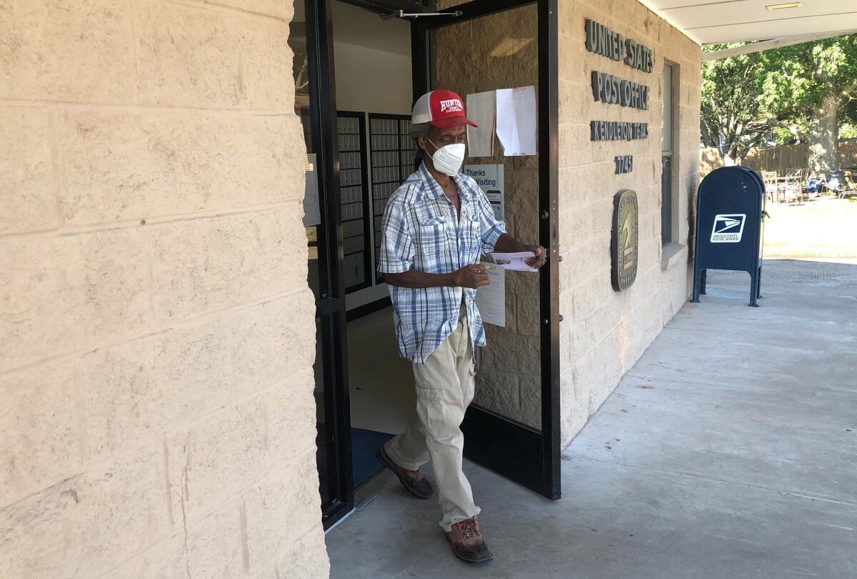 Arthur Hill drives to the post office to check his mail daily in his native Kendleton, Texas