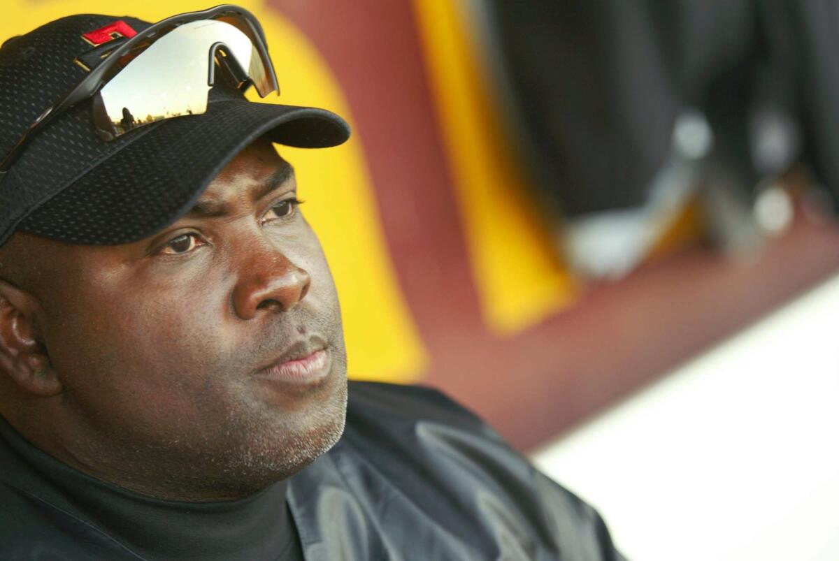 Tony Gwynn watches batting practice in 2003 before his San Diego State Aztecs played Arizona State. Gwynn, who died June 16, coached the Aztecs after retiring from the Padres.