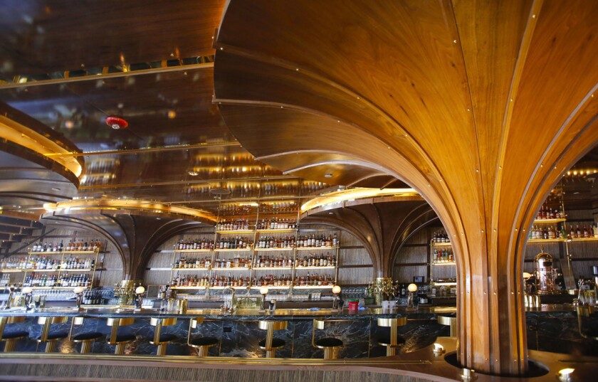 The inside of the main dining room at Born & Raised restaurant in Little Italy. (Howard Lipin/San Diego Union-Tribune)