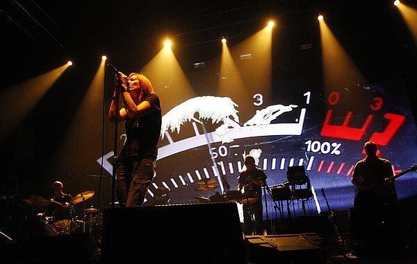 Vocalist Beth Gibbons fronts Portishead, the ominous and dreamy trip-hop band from Bristol, England, during a performance at the Shrine Expo Center in Los Angeles on Tuesday.