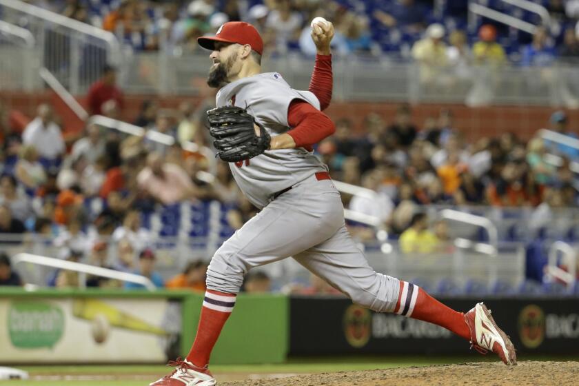 Pat Neshek agreed to a $12.5-million contract with the Houston Astros.