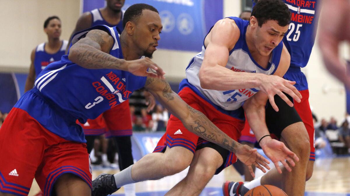 Connecticut's Ryan Boatright, left, steals the ball from Wyoming's Larry Nance Jr. during a scrimmage at the NBA combine in Chicago on May 14, 2015.