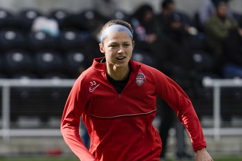 Washington Spirit forward Ashley Hatch (33) warms up prior to the first half of the NWSL Championship soccer match against Chicago Red Stars Saturday, Nov. 20, 2021, in Louisville, Kentucky. (AP Photo/Jeff Dean)