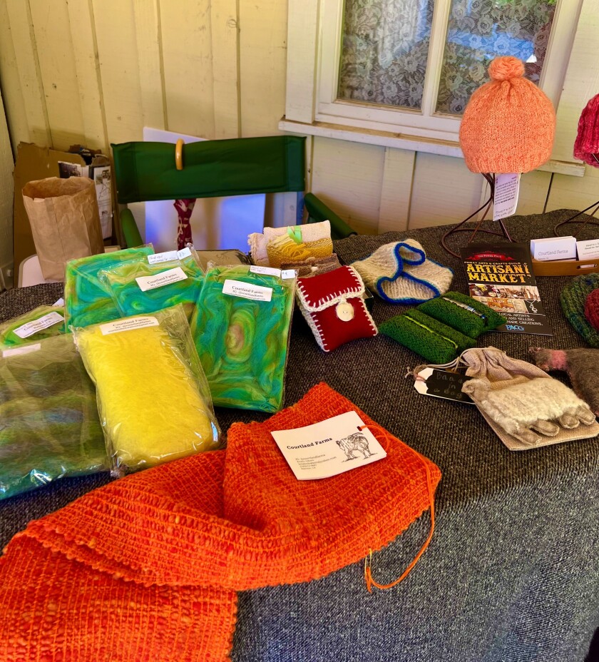 Kristin Osborn's knitted items on display at the Saturday craft market.
