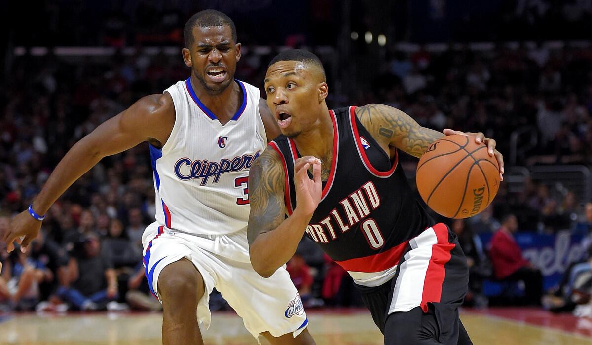 Chris Paul, left, and the Clippers could have their hands full with point guard Damian Lillard and the Trail Blazers on Saturday when they play at Staples Center.