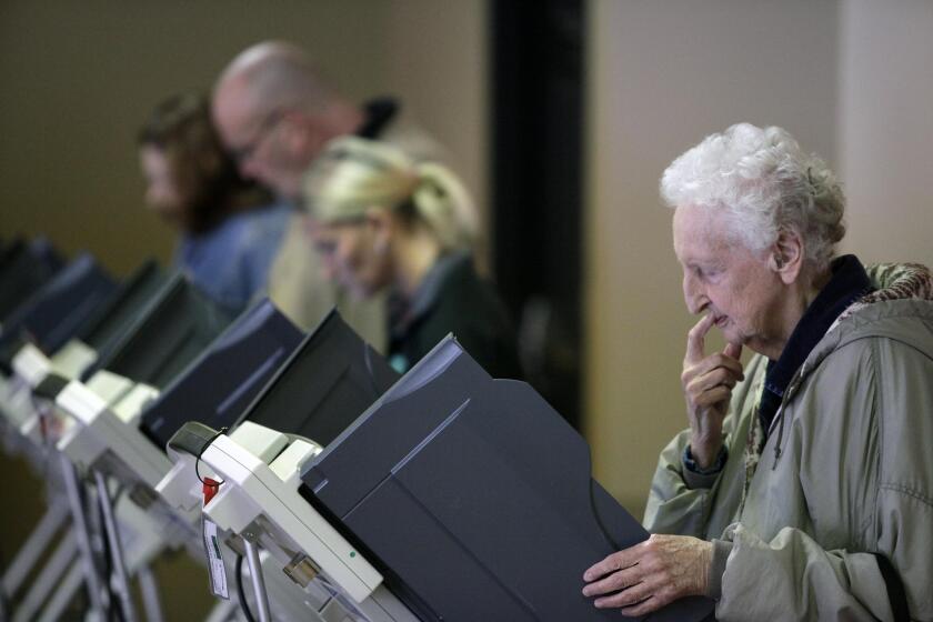 Voters cast their ballots at UAW Local 14 in Toledo, Ohio.