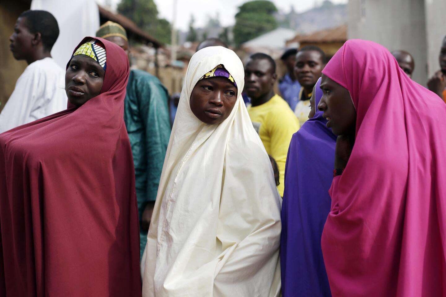 Nigerians wait to register before voting in Jere, northeastern Nigeria.