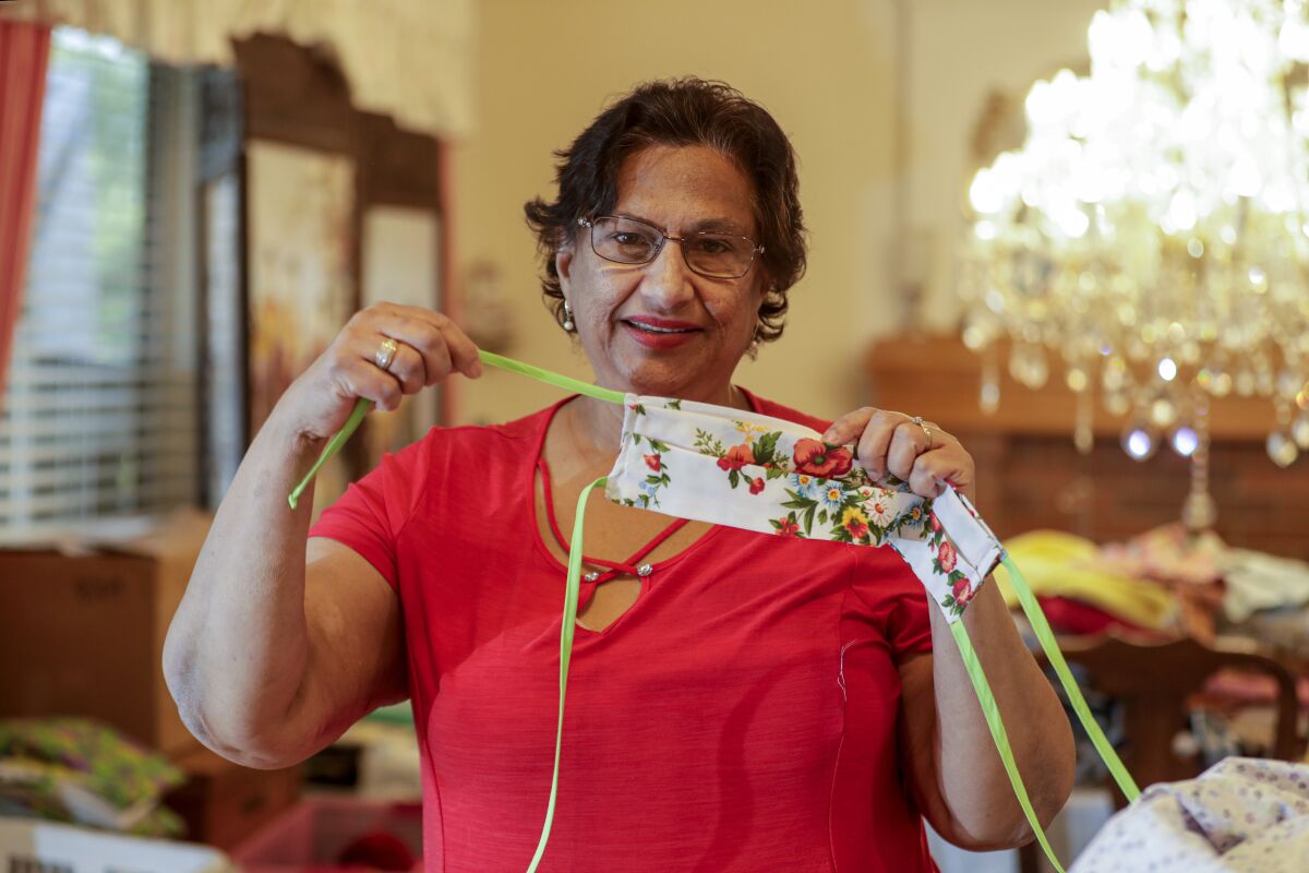 Bibi Sheonarine displays a handmade mask