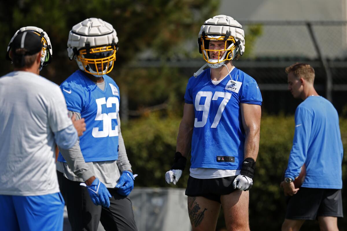 Chargers edge rushers Khalil Mack (52) and Joey Bosa (97) practice during camp.