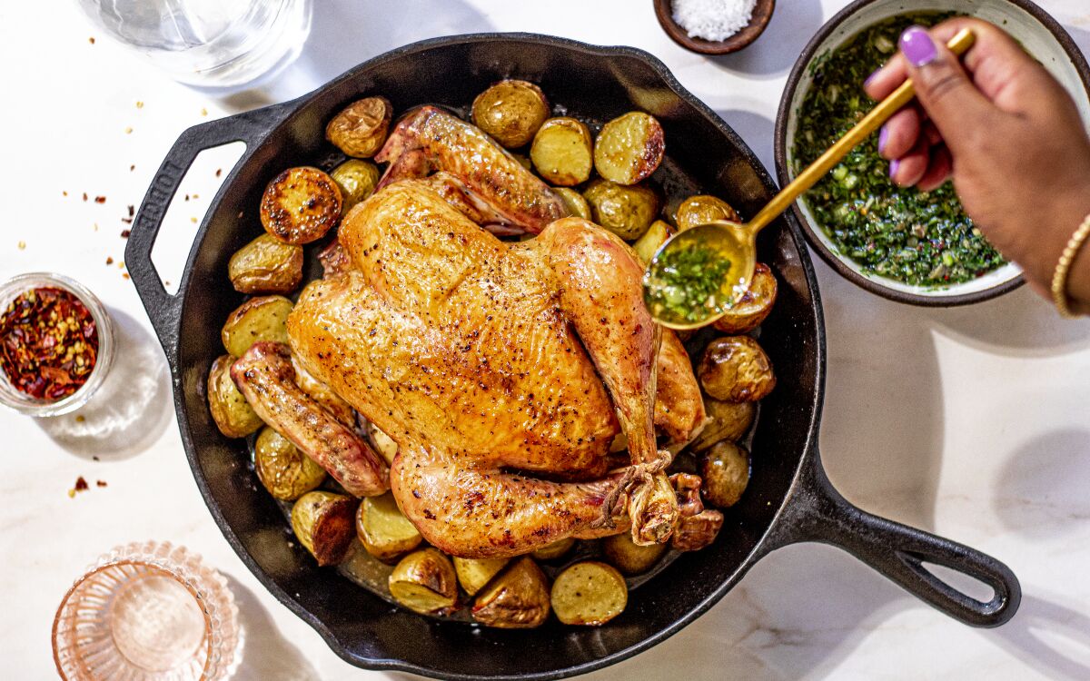 A pre-salted bird makes fast work of this relaxed roast chicken dinner with potatoes and herby salsa verde.