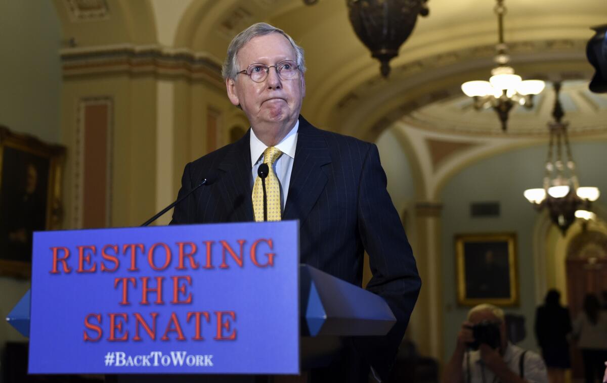 Senate Majority Leader Mitch McConnell (R-Ky.) speaks to reporters on Capitol Hill in Washington on Thursday.