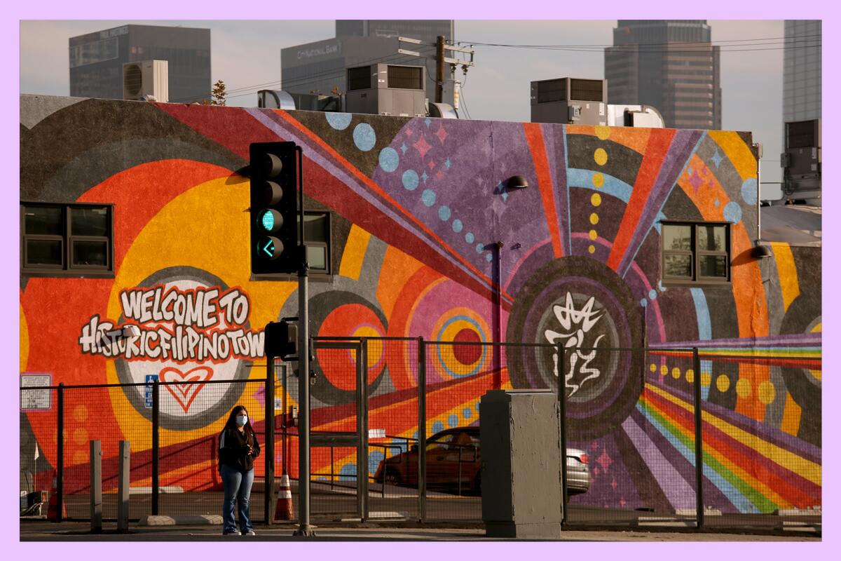 A colorful mural with the words "Welcome to Filipinotown."